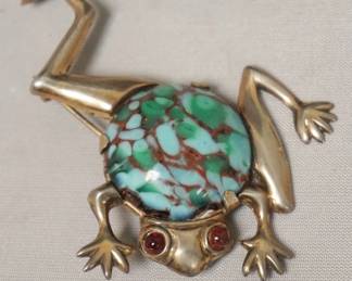 1223	STERLING SILVER FROG PIN WITH STONE STOMACH AND RED STONE EYES
