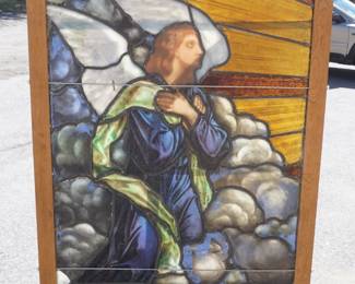 1039	LARGE ANTIQUE STAIN GLASS WINDOW IN FRAME DEPICTING CHRIST WITH ANGELS ABOVE, APPROXIMATELY 70 1/2 IN X 33 IN OVERALL
