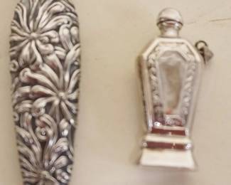 1057	2 VICTORIAN STERLING SILVER PERFUMES, TALLEST APPROXIMATELY 3 1/2 IN
