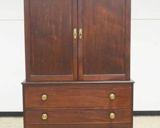 1184	ANTIQUE MAHOGANY LINEN PRESS, 2 PART, 2 DOOR OVER 4 DRAWERS, SOME LOSS TO TRIM, APPROXIMATELY 47 IN X 20 IN X 92 IN HIGH
