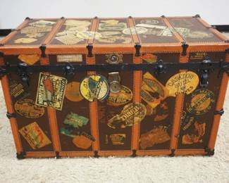 1166	ANTIQUE TRAVEL TRUNK W/TRAVEL STICKERS & 3 INTERIOR TRAYS, BB & B TRUNK CO, APPROXIMATELY 63 IN X 23 IN X 26 IN HIGH
