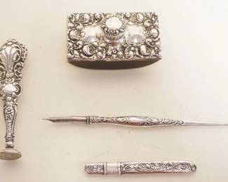 1064	STERLING SILVER GROUP OF ASSORTED DESK ITEMS INCLUDING BLOTTER, WAX SEAL, PEN & PENCIL
