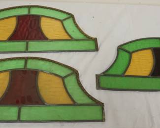 1042	3 ANTIQUE STAIN GLASS BELL SHAPED PANELS, EACH APPROXIMATELY 19 1/2 IN X 8 3/4 IN

