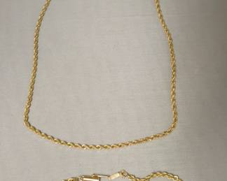 1282	MARKED 14K GOLD TWIST CHAIN, APPROXIMATELY 16 IN L AND BRACELET APPROXIMATELY 7 IN L, 8.5 DWT
