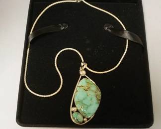 1253	STERLING SILVER TURQUOISE NECKLACE, 18 IN CHAIN, PENDANT MEASURES APPROXIMATELY 3 IN X 1 1/2 IN W
