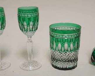 1051	BOHEMIAN GLASS EMERALD GREEN CUT TO CLEAR 4 PC. ASSORTMENT INCLUDING 2 6 IN WINES, TUMBLER AND SMALL BOTTLE WITH STOPPER
