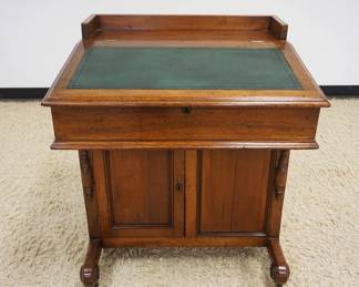 1158	ANTIQUE DOVETAILED WALNUT DAVENPORT DESK W/SINGLE DOOR COMPARTMENT & 3 DRAWERS W/GRAPE CARVED PULL HANDLES & LEATHER TOP, APPROXIMATELY 30 IN X 25 IN X 35 IN HIGH
