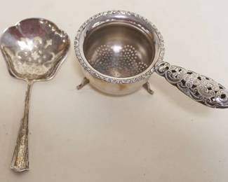 1063	STERLING SILVER FOOTED STRAINER AND STRAINING SPOON, 1.46 TOZ
