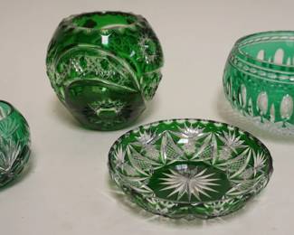 1050	BOHEMIAN GLASS EMERALD GREEN CUT TO CLEAR 4 PC. ASSORTMENT INCLUDING VASES & BOWLS, TALLEST PC. APPROXIMATELY 5 IN H
