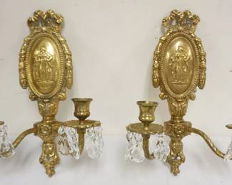 1001	PAIR OF ORNATE SOLID BRASS CANDLE SCONCES, EACH APPROXIMATELY 13 1/2 IN X 9 IN
