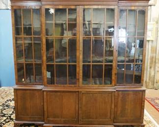 1178	ANTIQUE GEORGIAN MAHOGANY BREAKFRONT 2 PART W/INDIVIDUAL PANE GLASS DOORS, SOME VENEER LOSS, APPROXIMATELY 17 IN X 90 IN X 85 1/2 IN
