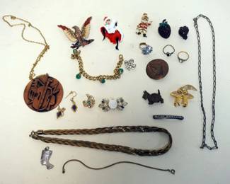 1284	ASSORTED JEWELRY INCLUDING NECKLACES, PINS AND MORE
