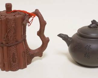 1006	2 ASIAN CLAY TERRACOTTA TEA POTS, LARGEST APPROXIMATELY 6 IN H
