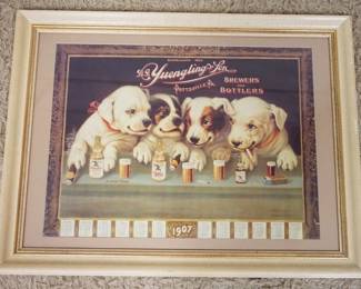 1120A	ANTIQUE BEER 1907 FRAMED CALENDAR DG YUENGLING & SONS DEPICTING DOGS AT A BAR LISTENING TO A *GOOD STORY*, APPROXIMATELY 34 1/4 IN X 25 1/2 IN OVERALL
