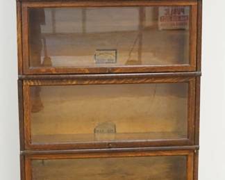 1156	4 SECTION OAK GLOBE WERNICKE BARRISTER BOOKCASE  W/LOWER DRAWER AT BASE, 3-299-12 1/4, 1-299-10 1/4, APPROXIMATELY 34 IN X 12 IN X 65 IN HIGH
