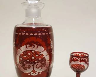 1047	BOHEMIAN GLASS RUBY CUT TO CLEAR DECANTOR AND CORDIAL DECANTOR, APPROXIMATELY 11 IN H
