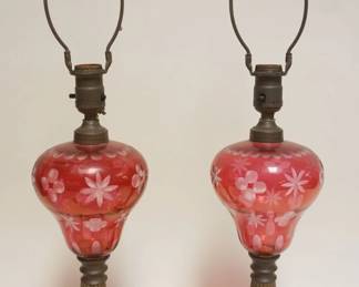 1075	PAIR OF ANTIQUE KEROSENE LAMPS WITH CRANBERRY TO CLEAR FONTS ON MARBLE BASES, BURNER REPLACED WITH LIGHT FIXTURES, EACH APPROXIMATELY 26 IN H OVER ALL

