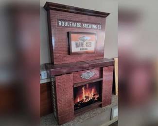 Lot 43: Cardboard fireplace advertising Boulevard Brewing Co. approx 45.5" x 14" x 67"
