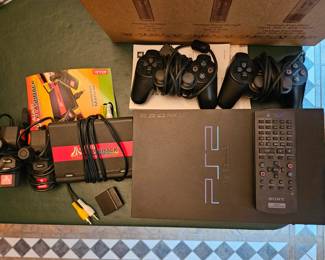 $ 65 PS2  Sony Playstation 2 & 2 controllers.   $12 Atari Flashback w/2 controllers