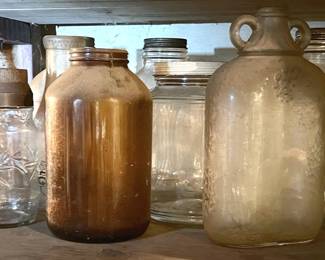 Several Large Amber Clear Glass Jars and Bottles In Basement 