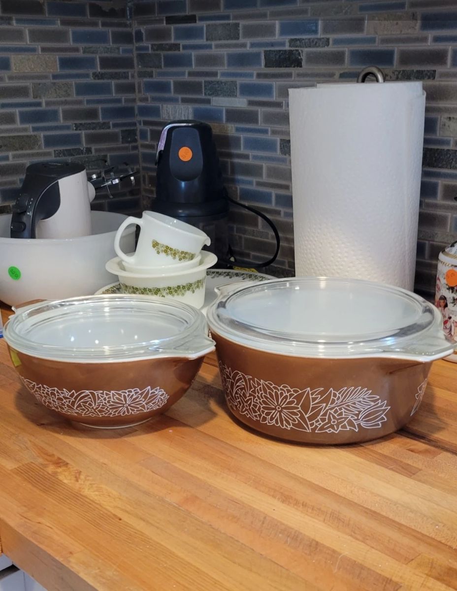 Like new. No flea bites. Lids are in exquisite condition. No chips. These bowls are amazing!