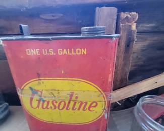 Putting out fire with...vintage gas can