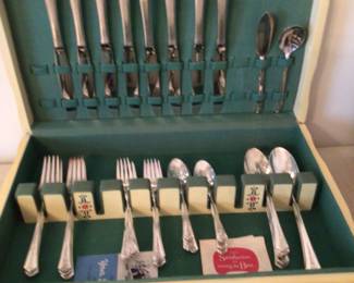 Holmes & Edwards Inlaid Silverplate flatware set. 1949 "Spring Garden", 46 pieces with chest $325.