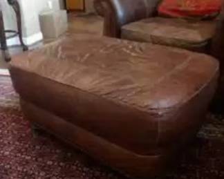 Star Furniture leather ottoman with patterned leather and western accents
