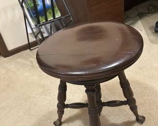 Round vintage piano stool