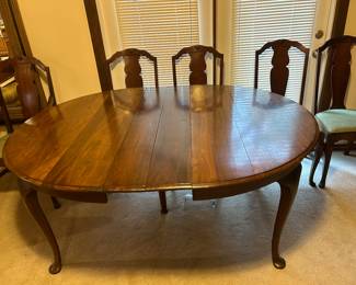 Dining table with five chairs