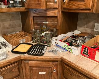 Boxes contain kitchen utensils, knife set, pitcher & glasses set, sets of silverware and more!