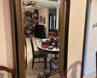 Large mirror on dining room wall
