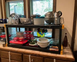 Pyrex with covers, bowls, pie plates, and rooster stained glass to hang 