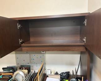 Inside cabinet of desk