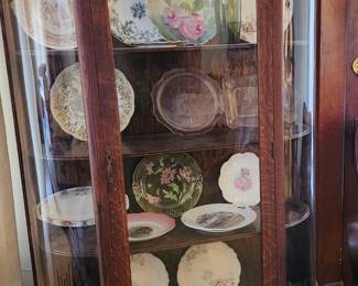 Antique curved glass China cabinet. 