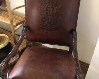 Pair of leather tooled occasional chairs