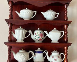 Lenox miniature teapots with display. 