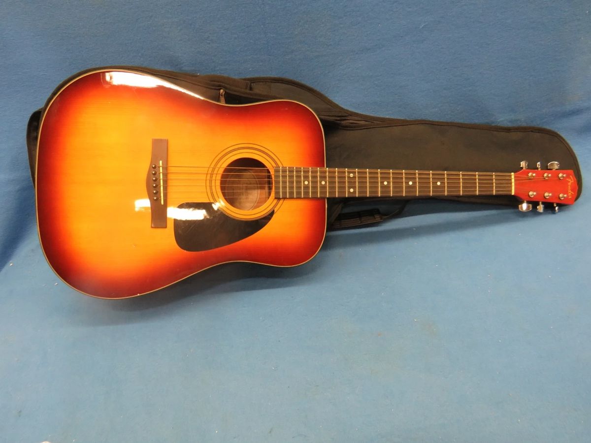 Lot 13. Fender acoustic guitar.  Model DG-11  SB.  Excellent condition.  Includes case.