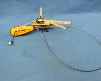 Lot 254. Helibus helicopter toy made in West Germany.  Needs repair