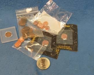Lot 380. 1972 40% silver Eisenhower Dollar, 19 Wheat Pennies, and more