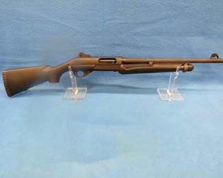 Lot 14. Benelli Nova Tac-12-gauge pump-action shotgun.  SN Z0995951N,  Appears to be in excellent condition.