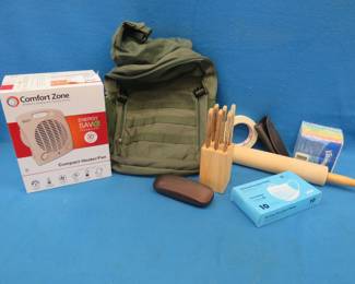 Lot 418. Knife set, rolling pin, backpack, and more