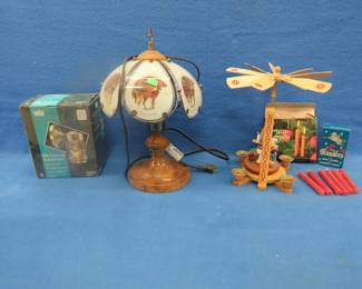 Lot 211. An indoor lamp, an outdoor light, and a heat activated spinning angel decorative item