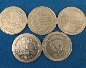 Lot 396. Five old casino tokens.  Many are from closed casinos.