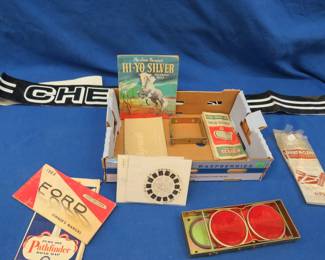 Lot 147. Vintage gas station road maps, at least one from the 40s, reflectors, Lone Ranger coloring book, and more