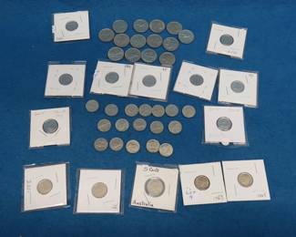Lot 206. $3.50 face value of 80% Canadian silver quarters, $.75 face value of 50% Canadian silver quarters,  Sixty-plus Canadian (non-silver) coins