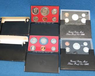Lot 237. Four US Mint Proof Sets: 1975, 1979, 1996, and 1997