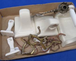 Lot 161. Vintage porcelain bathroom racks, coat hooks, and more