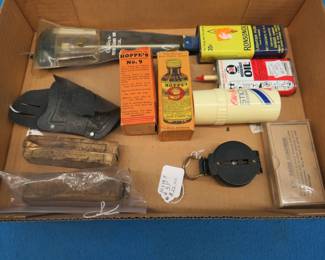 Lot 163. Gun cleaning items, old ammo boxes, compass, and more