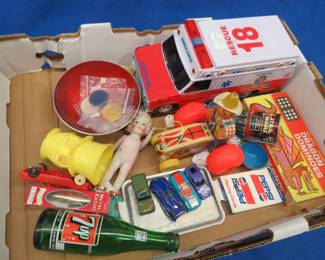 Lot 240. Vintage toys including Fisher Price, Pepsi playing cards, and more